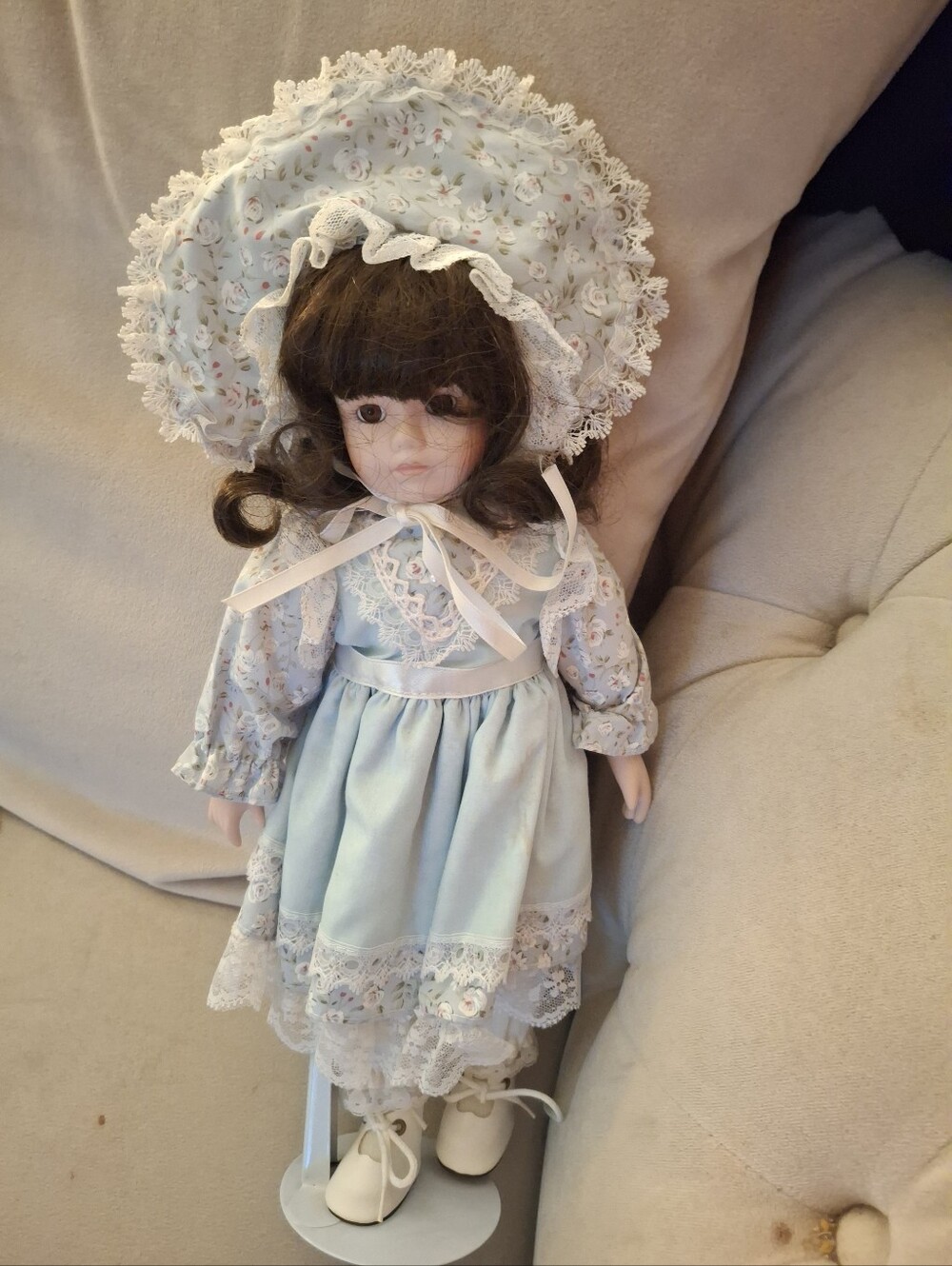 Porcelain Collectible Doll in Light Blue Dress and Bon.does Not Come In Box